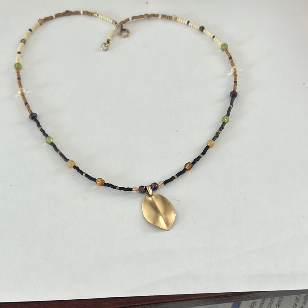 Gold and Black Beaded Necklace with Circular Pendant